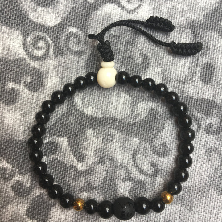 Pulsera ónix/ágata con cuenta grabada con mantra - NALANDA | Tu motor de búsqueda interna
